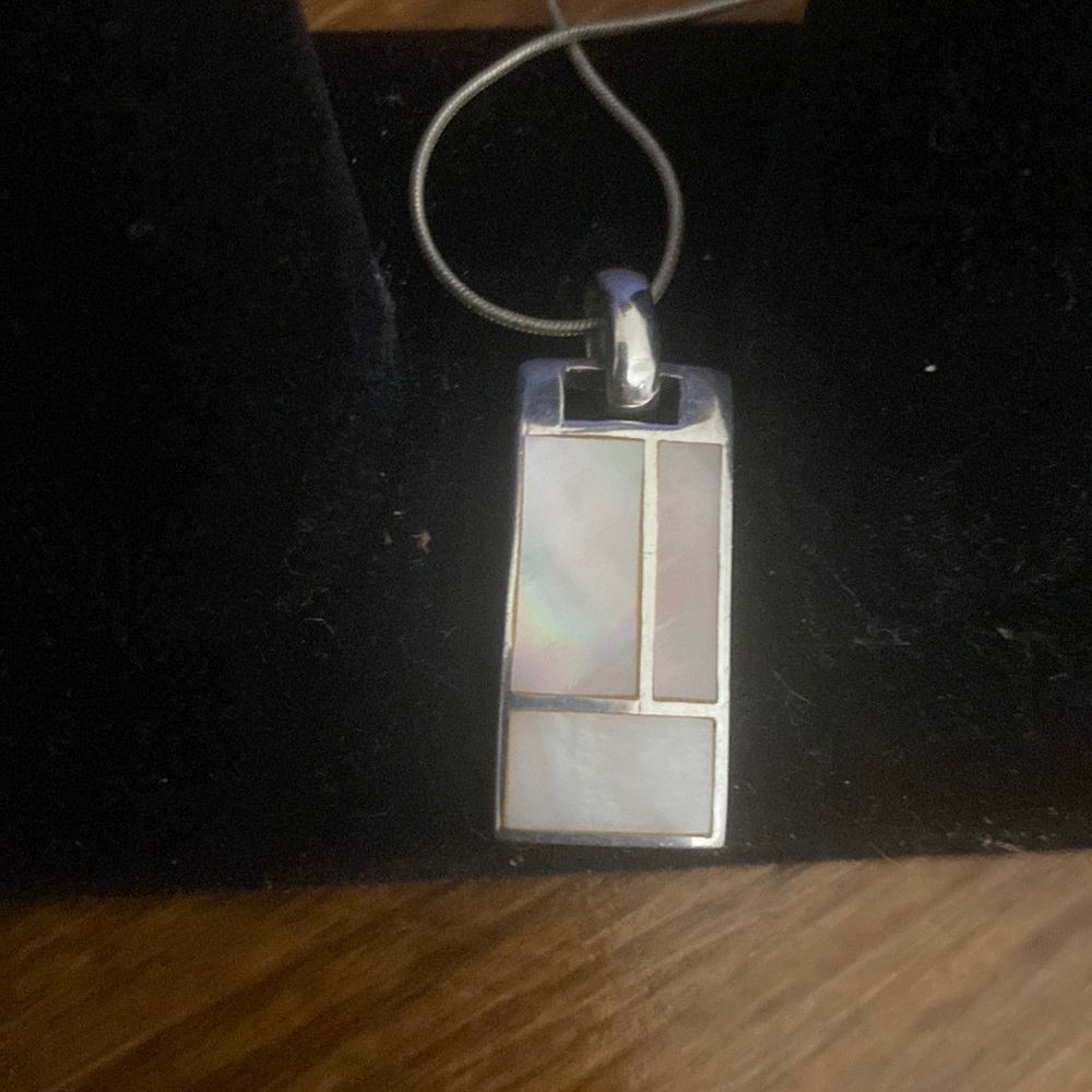 This is a nice necklace with a pendant. No scratches.925stamp